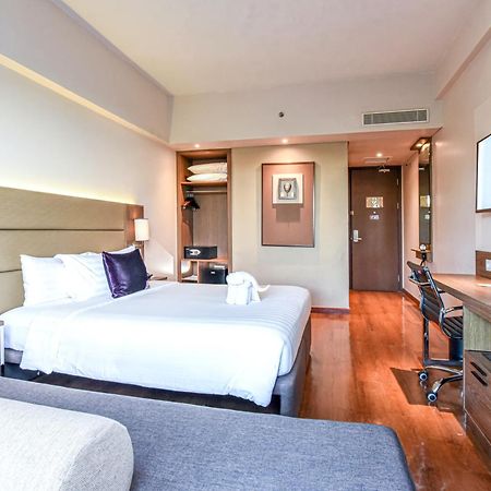 พรีเมียร์ เพลซ สุราบายาแอร์พอร์ต Hotel ซิโดอาร์โจ ภายนอก รูปภาพ